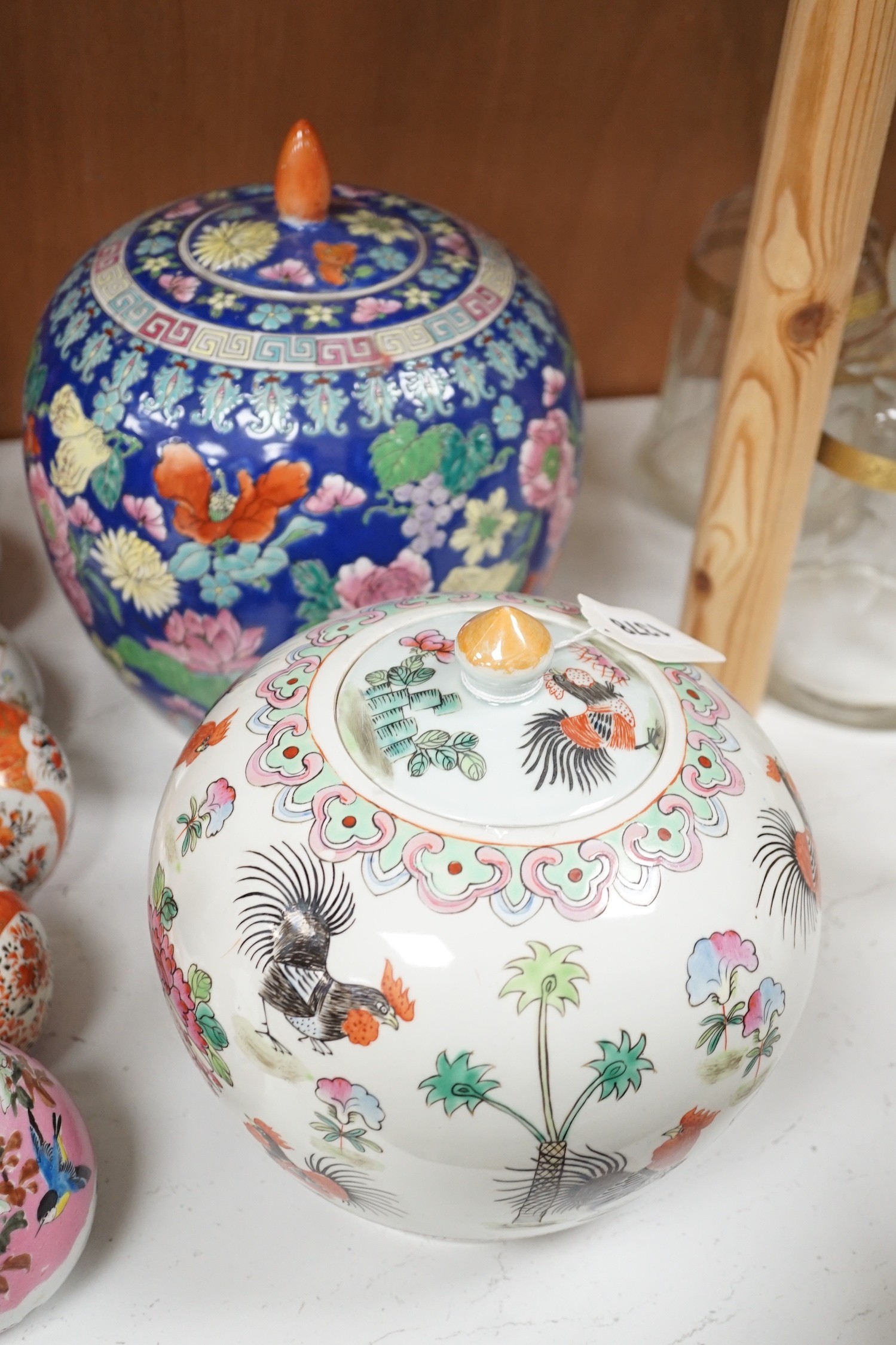 6 Japanese Kutani porcelain bottle vases together with two Chinese famille rose jars and covers, tallest 24cm